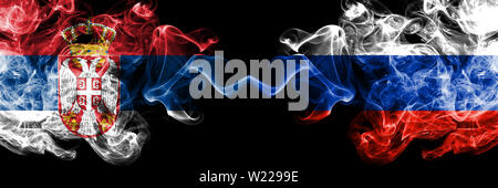 Sebian Vs. Russian Flags Russian and Serbian Flags Together Symbol at Blue Sky Stock Photo - Alamy