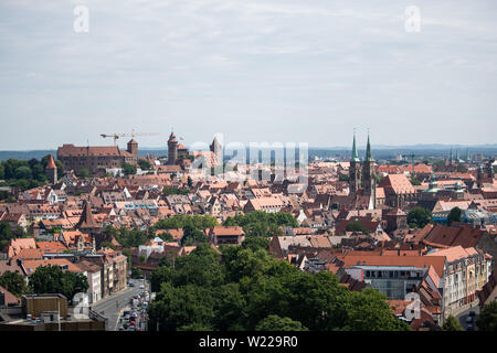 Nuremberg, Germany. 05th July, 2019. Panoramic view from the skyscraper at the Plärrer to the old town at the edge of a press conference on the Nuremberg Capital of Culture application. On the left the Kaiserburg can be seen, on the right the towers of the Protestant church St. Sebald. The Free State of Bavaria will support Nuremberg's bid to become European Capital of Culture in 2025 with 30 million euros if Nuremberg is awarded the contract by the European jury. Credit: Daniel Karmann/dpa/Alamy Live News Stock Photo