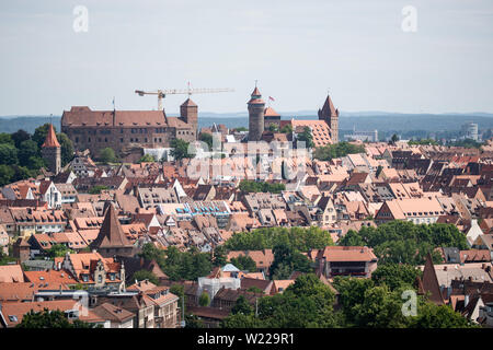 Nuremberg, Germany. 05th July, 2019. Panoramic view from the skyscraper at the Plärrer to the old town at the edge of a press conference on the Nuremberg Capital of Culture application. The Kaiserburg can be seen in the background. The Free State of Bavaria will support Nuremberg's bid to become European Capital of Culture in 2025 with 30 million euros if Nuremberg is awarded the contract by the European jury. Credit: Daniel Karmann/dpa/Alamy Live News Stock Photo