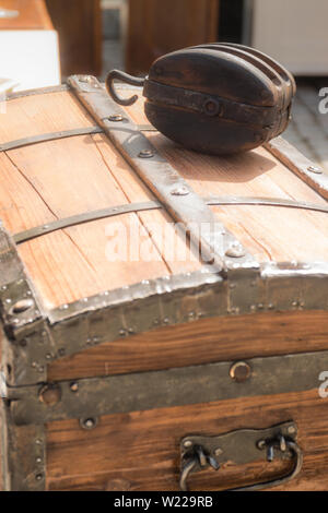 Old chest trunk on sun in the market. Stock Photo