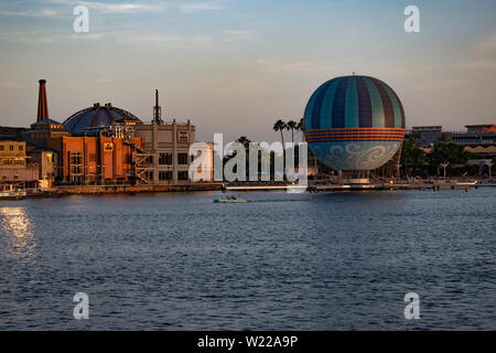 Orlando, Florida. June 15, 2019.  Panoramic view of dockside and air balloon on blue night at Lake Buena Vista. Stock Photo