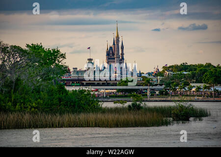 Orlando, Florida. June 03, 2019. Panoramic view of Cinderellas Castle and vintage Train Station at Magic Kingdom in Walt Disney World Stock Photo