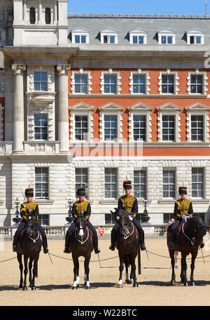London, England, UK. Members of the King's Troop, Royal Horse Artillery, taking part in the daily Changing of the Guard at Horse Guards parade in Whit Stock Photo