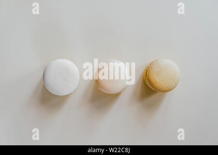 Color macarons on the background, in the shape of buttons. Stock Photo