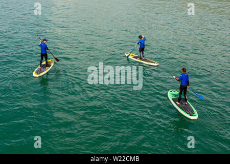 Boscombe, Bournemouth, Dorset, England, UK, 5th July 2019, Weather: Temperatures are on the rise Friday morning making this the warmest day of July so far in what will be a short lived heatwave. Paddle boarders are out early to enjoy the calm sea conditions. Credit: Paul Biggins/Alamy Live News