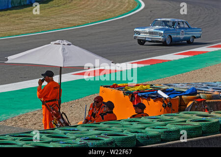 MAGNY-COURS, FRANCE, June 29, 2019 : Marshalls at the chicane. French Historic Grand Prix takes place on Magny-Cours race track every two years. Stock Photo