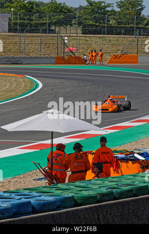 MAGNY-COURS, FRANCE, June 29, 2019 : Marshalls at the chicane. French Historic Grand Prix takes place on Magny-Cours race track every two years. Stock Photo