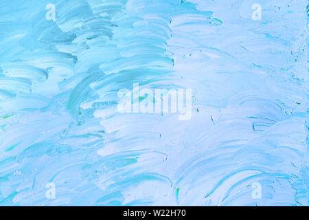 Blue and white painted textured strokes on a canva Stock Photo