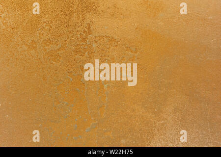 cement gold orange painted wall floor surface Stock Photo