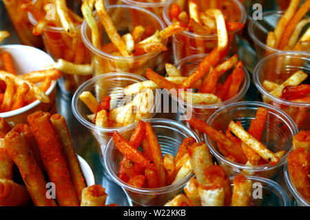 Download Photo Of Cheese Flavored French Fries In Plastic Cups Stock Photo Alamy Yellowimages Mockups