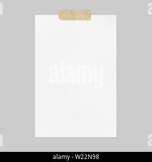 Blank white paper sheet mockup on light gray background, front view a4 poster mockup with adhesive tape and copy space Stock Photo