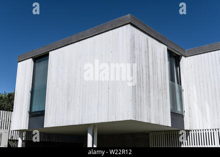 Modern House with wood cladding. Modern architecture Stock Photo