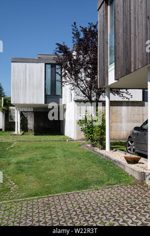 Modern Houses with wood cladding. Modern architecture Stock Photo