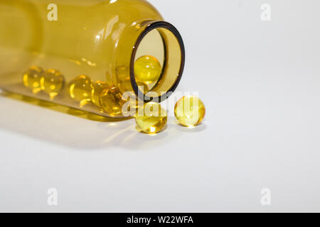 Download Yellow Transparent Round Tablets In A Transparent Bottle Stock Photo Alamy PSD Mockup Templates