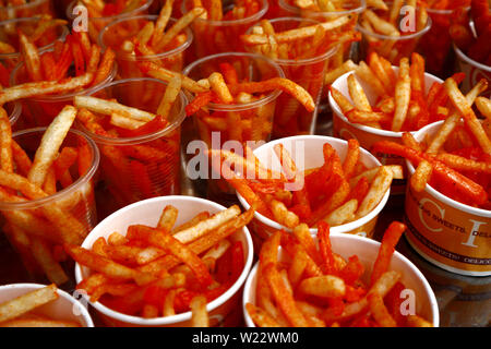 Download Photo Of Cheese Flavored French Fries In Plastic Cups Stock Photo Alamy PSD Mockup Templates