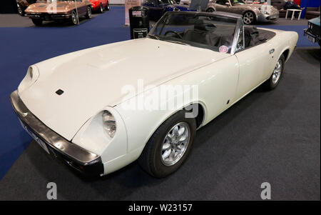 Three-quarters front view of a White, Jensen Healey on display at the 2019 London Classic Car Show Stock Photo