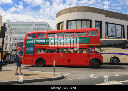 London, UK. 5th July, 2019. An old routemaster double, decker bus in Wimbledon town centre used as a shuttle to transport spectators to the Wimbledon Lawn Tennis Championships. Credit: Amer Ghazzal/SOPA Images/ZUMA Wire/Alamy Live News Stock Photo