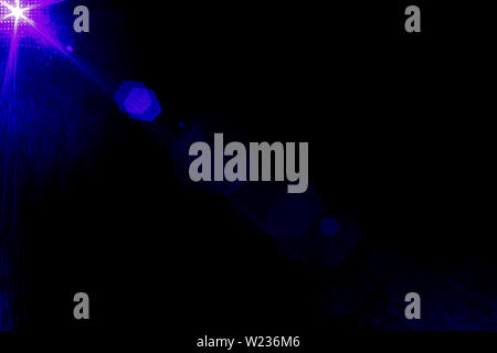 Camera lens flare by laser light create hexagons of objective iris shapes of number depending on number of lens surface and interference effect. Stock Photo