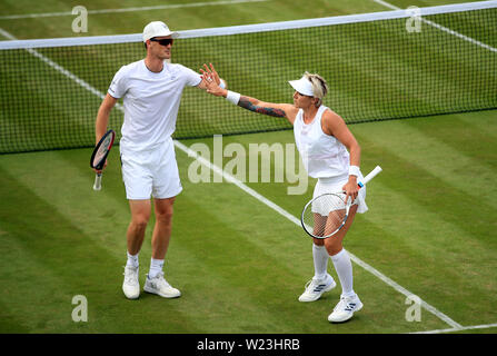 Jamie Murray and Bethanie Mattek-Sands in action in the mixed doubles on day five of the Wimbledon Championships at the All England Lawn Tennis and Croquet Club, Wimbledon. Stock Photo