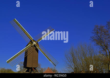 papenburg, niedersachsen/germany - april 20, 2013:  historic windmill (bockwindmuehle) at wiek in the city of papenburg Stock Photo