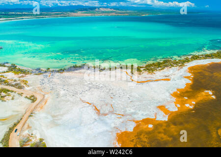 Aerial view of Puerto Rico. Faro Los Morrillos de Cabo Rojo. Playa Sucia beach and Salt lakes in Punta Jaguey. Stock Photo