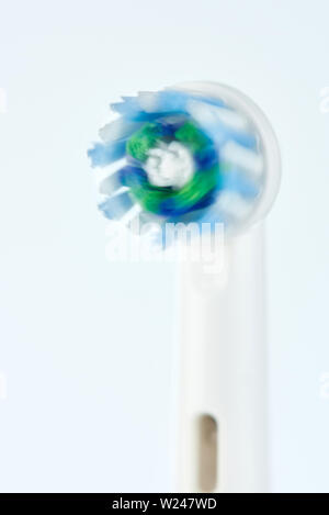Spinning toothbrush head isolated on white background Stock Photo