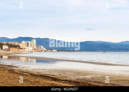 Follonica (GR), Tuscany, Italy. The town seen from the shore in a clear winter day Stock Photo