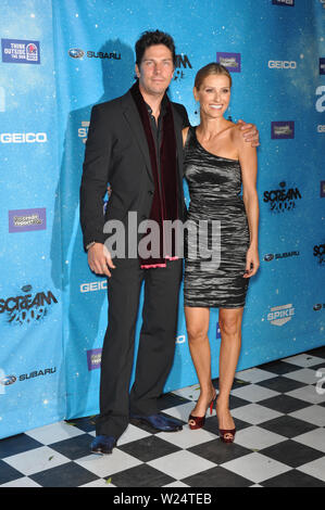 LOS ANGELES, CA. October 18, 2009: Michael Trucco & wife Sandra Hess at the 2009 Spike TV Scream Awards, at the Greek Theatre, Los Angeles. © 2009 Paul Smith / Featureflash Stock Photo