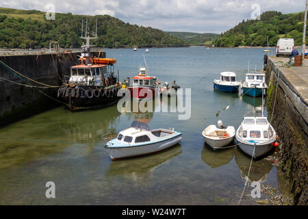 boats moored in union hall harbour or harbor Stock Photo