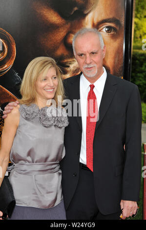 Los Angeles Times columnist Steve Lopez, who is portrayed by Robert Downey,  Jr. in the motion picture biographical drama The Soloist, attends the  premiere of the film with his wife Alison on