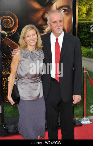 Los Angeles Times columnist Steve Lopez, who is portrayed by Robert Downey,  Jr. in the motion picture biographical drama The Soloist, attends the  premiere of the film with his wife Alison on