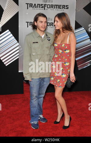 LOS ANGELES, CA. June 22, 2009: Emile Hirsch & date at the Los Angeles premiere of 'Transformers: Revenge of the Fallen' at the Mann Village Theatre, Westwood. © 2009 Paul Smith / Featureflash Stock Photo