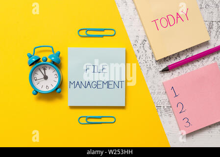 Handwriting text writing File Management. Conceptual photo computer program that provides user interface to analysisage data Notepads clips colored pa Stock Photo