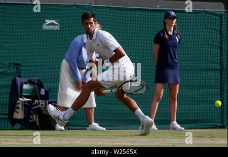 London, Britain. 5th July, 2019. Novak Djokovic of Serbia competes during the men's singles third round match with Hubert Hurkacz of Poland at the 2019 Wimbledon Tennis Championships in London, Britain, on July 5, 2019. Credit: Han Yan/Xinhua/Alamy Live News Stock Photo