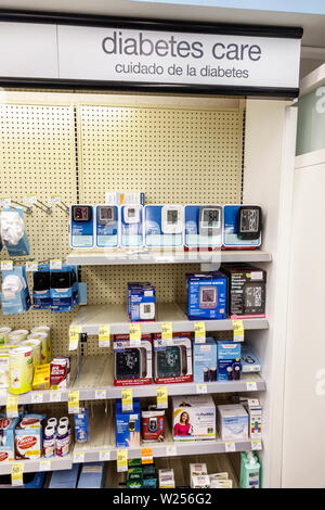 Miami Beach Florida,North Beach,Walgreens Pharmacy,shelves display sale inside,diabetes care,glucose meters,Spanish English languages sign,FL190531047 Stock Photo