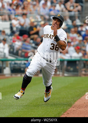 Pittsburgh, Pennsylvania, USA. 4th July, 2019. Pittsburgh Pirates third baseman Jose Osuna (36) sprints for the plate to score the Pirates first run of the game after a double by Pittsburgh Pirates shortstop Jung Ho Kang (16) in the bottom of the 2nd inning in the Major League Baseball game between the Chicago Cubs and Pittsburgh Pirates at PNC Park, in Pittsburgh, Pennsylvania. (Photo Credit: Nicholas T. LoVerde/Cal Sport Media) Credit: csm/Alamy Live News Stock Photo