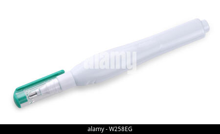 Green pen corrector on a white background Stock Photo
