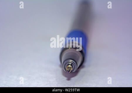 Tip of a blue ball point pen isolated from white background Stock Photo