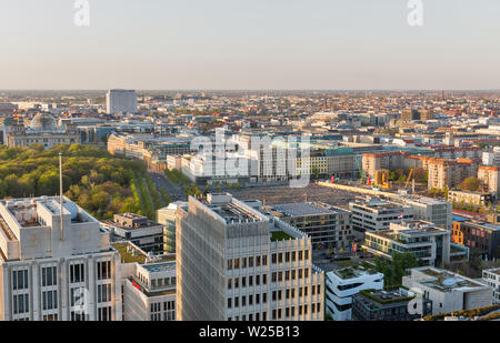 BERLIN, GERMANY - APRIL 18, 2019: Aerial cityscape with Memorial to the Murdered Jews of Europe, Tiergarten park, Reichstag and Charite hospital at su Stock Photo