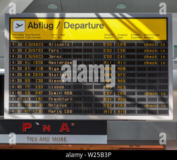 BERLIN, GERMANY - APRIL 20, 2019: Tegel airport departure flights status information display. Berlin is the capital and largest city of Germany by bot Stock Photo