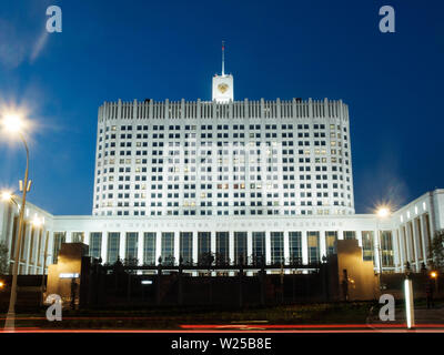 Moscow, Russia - 30 April 2019. The facade of The House of the Government of the Russian Federation in the evening. Long exposure shot Stock Photo