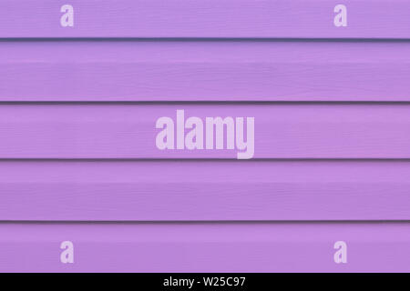 Violet wooden texture in lines, purple wood background. Pattern with pink wood planks on wall, floor. Wooden boards. Empty space. Siding frame striped Stock Photo