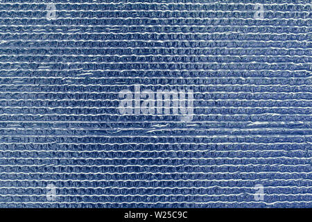 Blue Ribbed Plastic Texture Background with Wavy Industrial Pattern, Abstract Synthetic Surface for Packaging, Design and Modern Backdrop Stock Photo