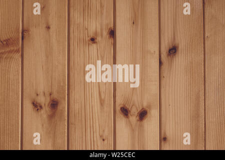 Natural Pine Wood Plank Texture with Warm Brown Grain and Knots, Rustic Timber Wall Background for Interior Design and Construction Stock Photo