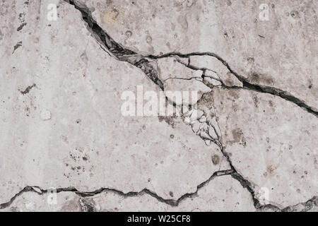 Cracked Concrete Wall Texture Background, Weathered Cement Surface with Fractures and Rough Aged Pattern, Urban Construction Damage Backdrop for Desig Stock Photo