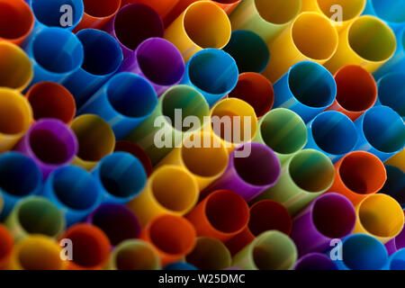 Abstract a colorful of plastic straws used for drinking water or soft drinks. Shallow DOF Stock Photo