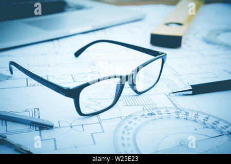 glasses on plan design.Concepts of architecture,construction,engineering Stock Photo