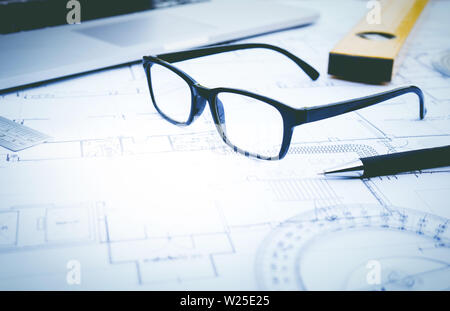 glasses on plan design.Concepts of architecture,construction,engineering Stock Photo