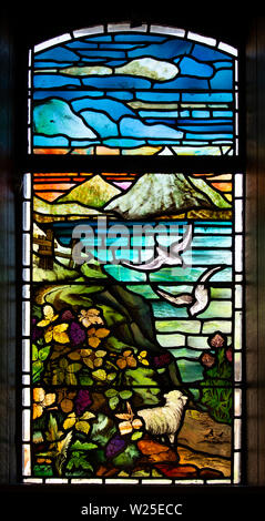 UK, Cumbria, Sedbergh, Marthwaite, St Gregory’s church window, depicting farming and landscape scene Stock Photo