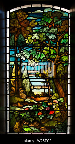 UK, Cumbria, Sedbergh, Marthwaite, St Gregory’s church window, depicting naturalistic woodland scene Stock Photo